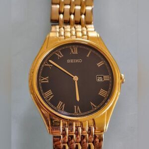 Seiko Gold and Black Roman Numeral  7N39-8000 Watch